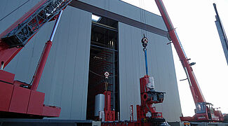 automated warehouse, stacker crane assembly